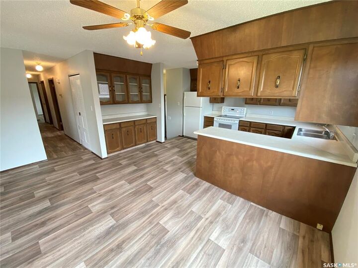 Property Photo: 58 Stewart Crescent SK S3N 3J5