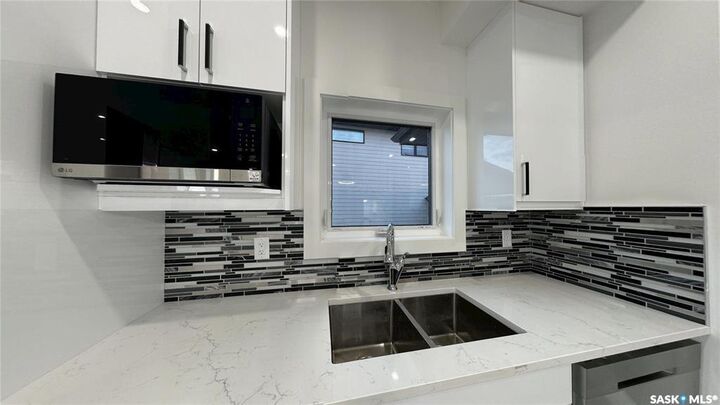 Property Photo: 355 Nazarali Way SK S7V 1X9