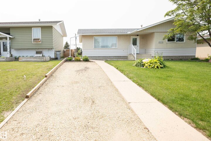 Property Photo:  10352 109 Ave  AB T7P 1G9 