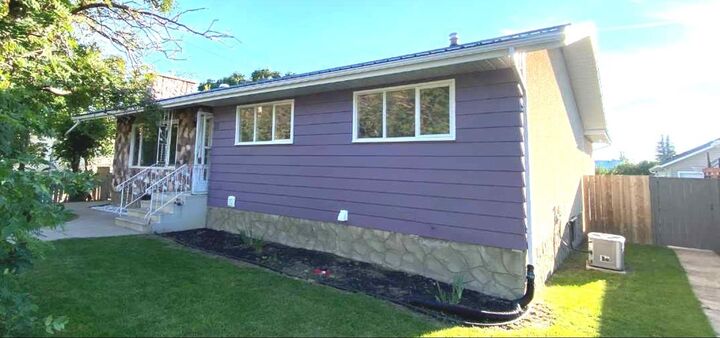 Property Photo:  31 10 Street W  AB T1R 0C1 