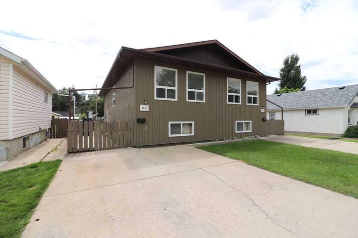 Property Photo:  1145 &Amp 1147 Yuill Street SE  AB T1A 0Z4 