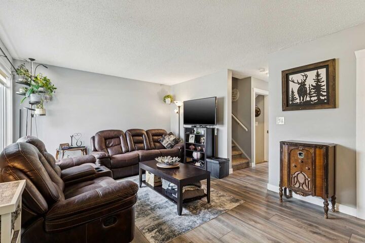 Property Photo: 107 Elm Place 113 AB T1S 1J1