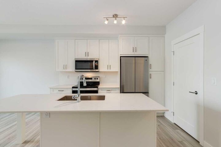 Property Photo: 500 Auburn Meadows Common SE 107 AB T3M 3P5