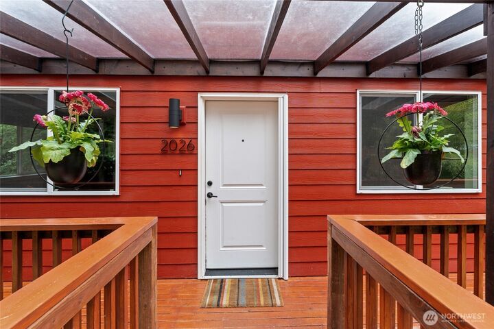 Property Photo:  2026  Island Drive NW  WA 98502 