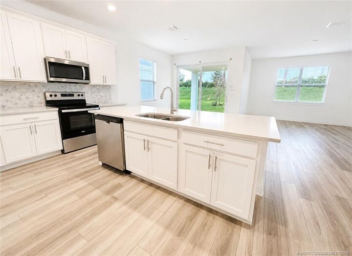 Property Photo:  8666 Dahlia Circle  FL 34986 