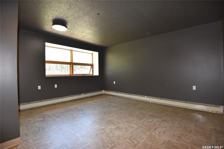 Property Photo:  102 Manor Drive 111  SK S0E 1E0 