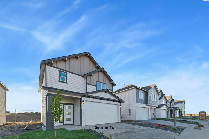 Property Photo:  205 N Dewberry Pl  WA 99336 