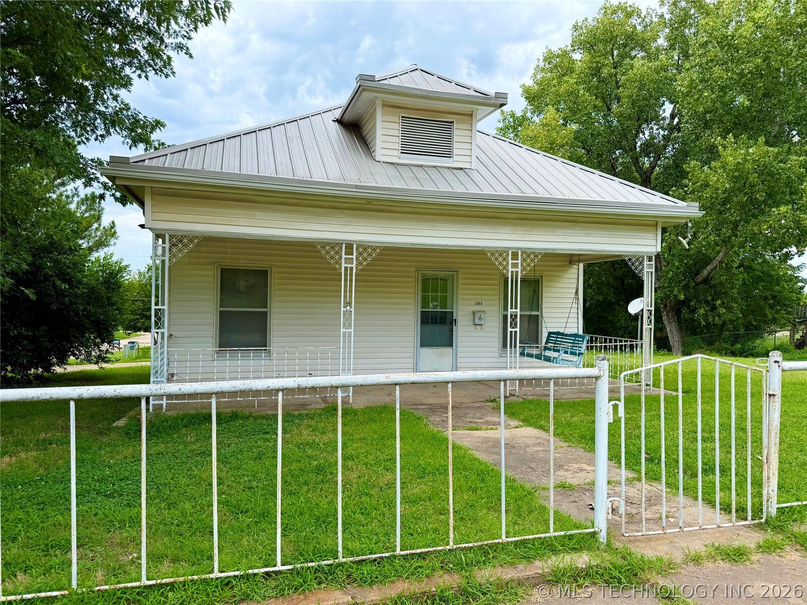 Property Photo:  203 N E Street  OK 74085 