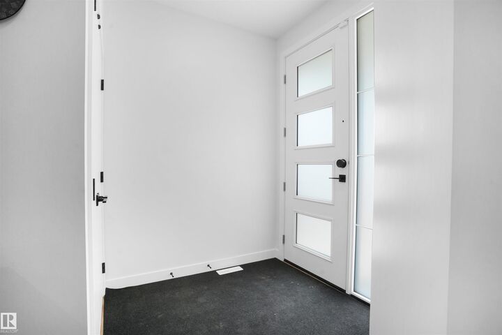 Property Photo: 3316 Chickadee Drive NW AB T5S 0V6