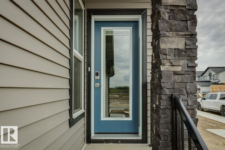 Property Photo: 2482 Egret Loop NW AB T6M 3R4