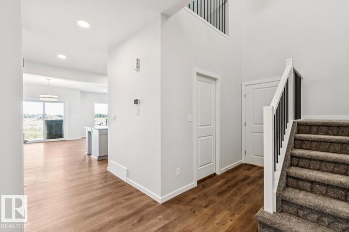 Property Photo: 2476 Egret Loop NW AB T6M 3R4