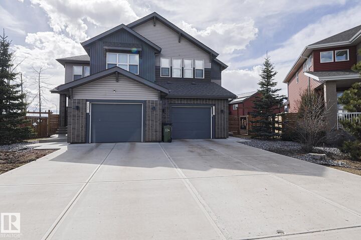 Property Photo: 720 Charlesworth Way SW AB T6X 2E9