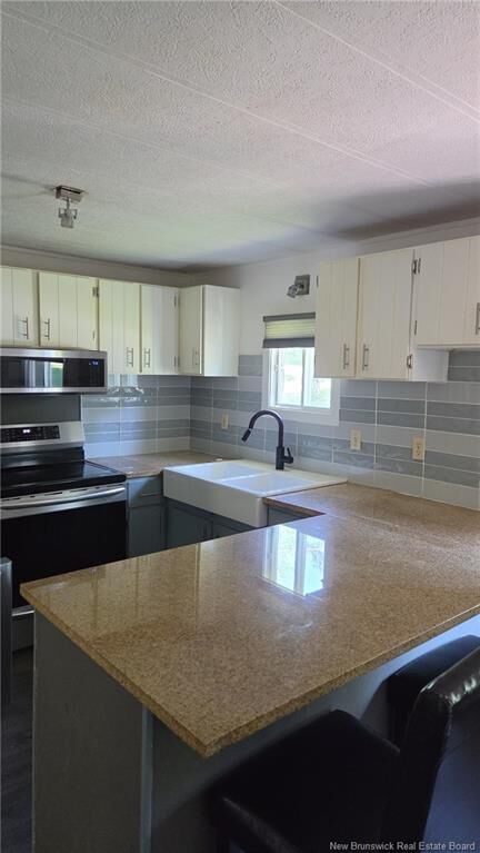 Property Photo: 14 Water Street NB E3B 1C8