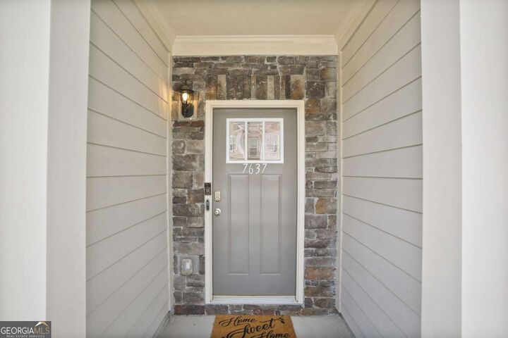 Property Photo:  7637 Avalon Boulevard  GA 30213 