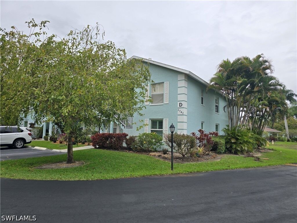 Property Photo:  5741 Whitaker Road D203  FL 34112 
