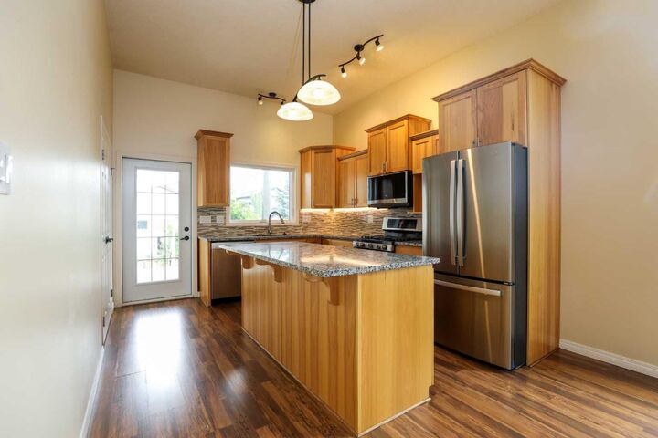 Property Photo: 227 Rivermill Manor W AB T1K 8C5