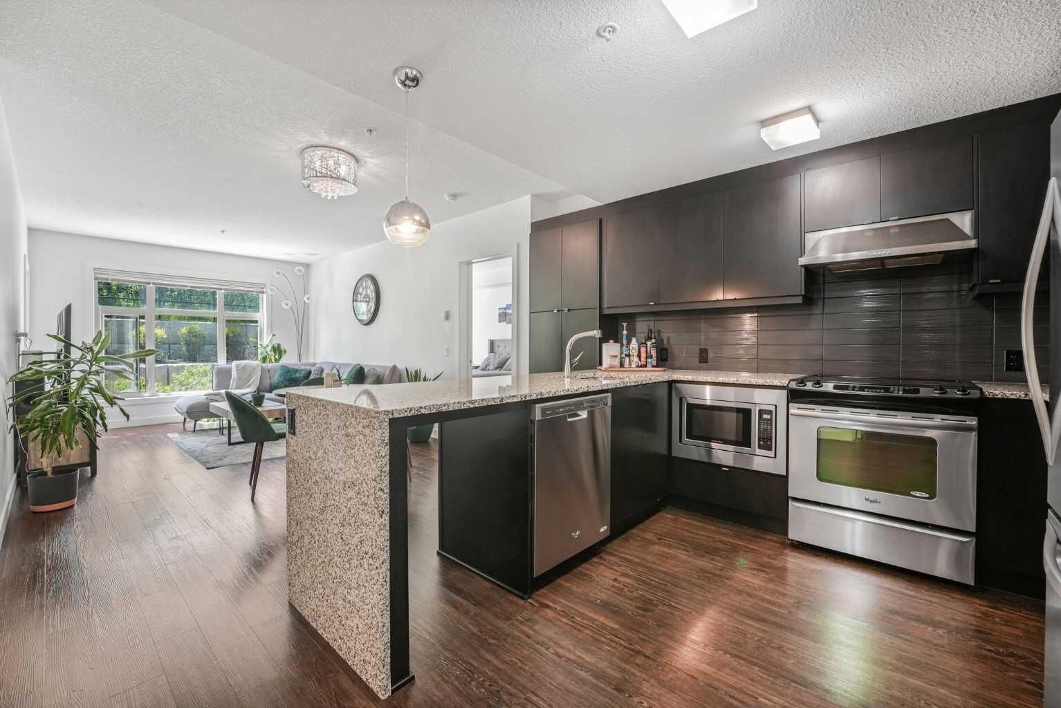 Property Photo: 25 Aspenmont Heights SW 111 AB T3H 0E4