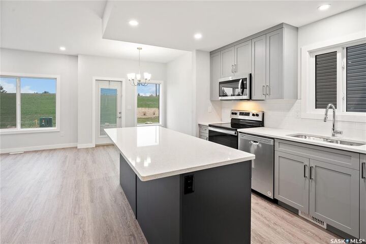 Property Photo:  1218 Yuel Way  SK S7W 1P2 