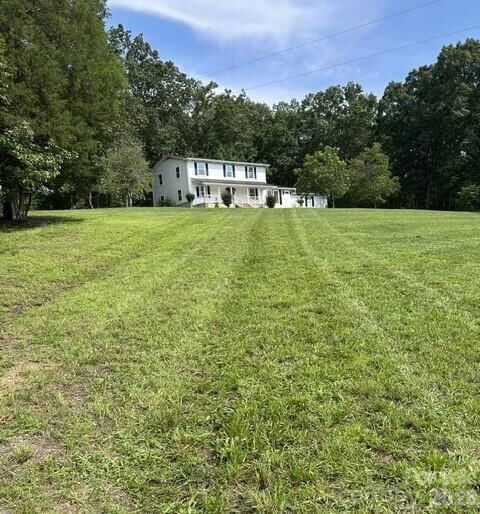 Property Photo:  33949 Rocky River Road  NC 28128 
