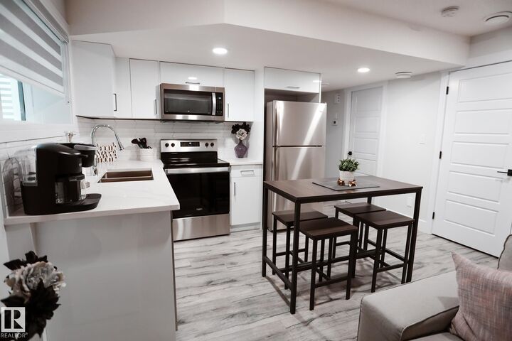 Property Photo: 7449 Chivers Crescent SW Bsmt AB T6W 4M2