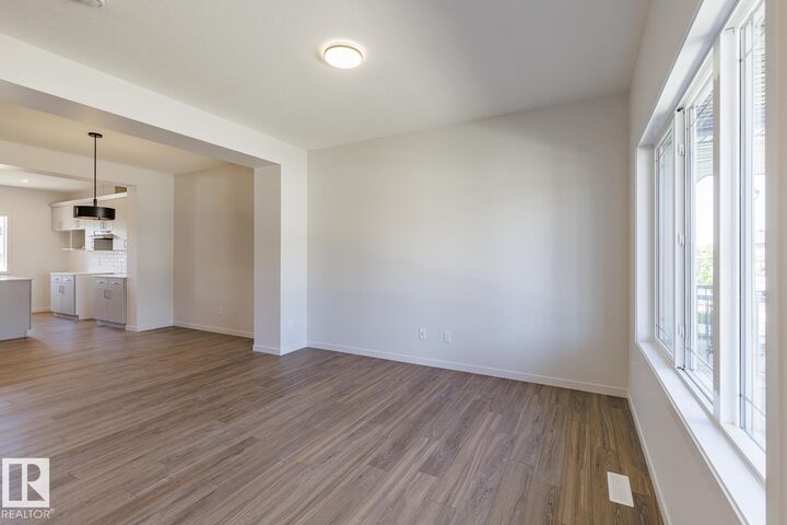 Property Photo: 3619 Triomphe Boulevard AB T4X 3A7