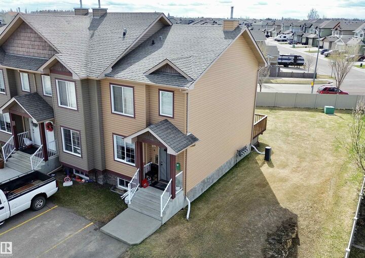 Property Photo: 320 Spruce Ridge Road 4 AB T7X 0H5
