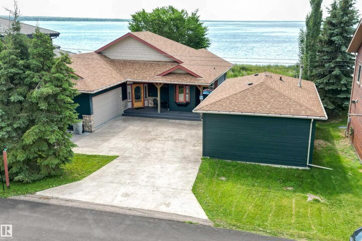Property Photo: 103 Argentia Beach AB T0C 2C0
