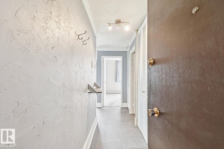Property Photo: 9930 113 Street NW 1107 AB T5K 1N6