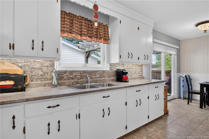 Property Photo:  24 Olympic Crescent  NB E1E 4B7 