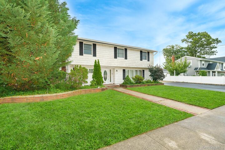 Property Photo:  195 N Albany Avenue  NY 11758 