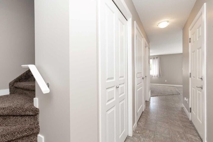 Property Photo: 205 Silkstone Road W 6 AB T1J 4J9
