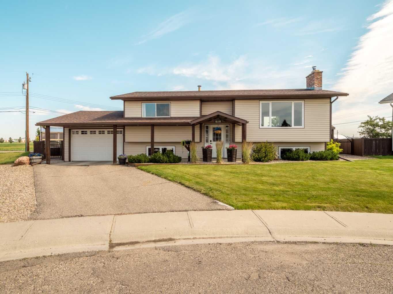 Property Photo: 6109 57 Street AB T1G 1K1