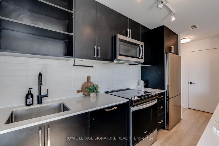 Property Photo: 2300 St. Clair Avenue W 517 ON M6N 1K8