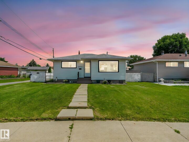 Property Photo: 13323 58 Street NW AB T5A 0P9