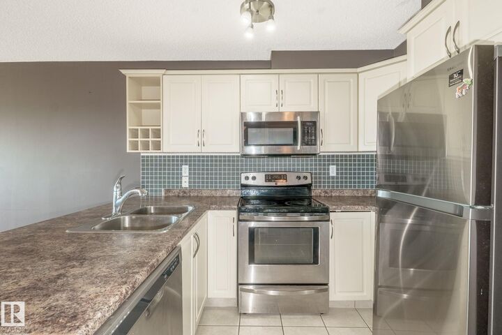Property Photo: 17404 64 Avenue NW 418 AB T5T 6X4