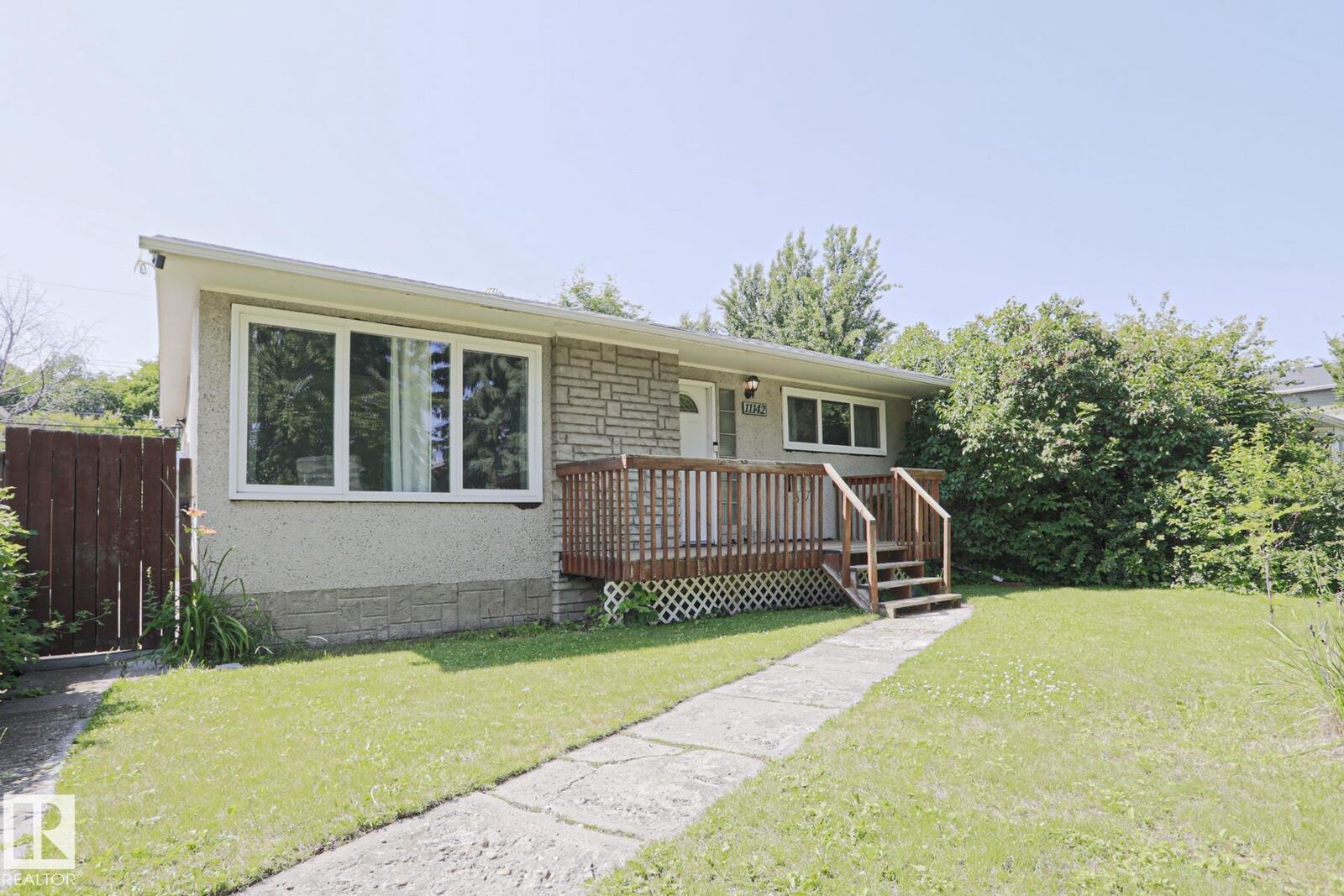 Property Photo: 11142 51 Street NW AB T5W 3E6