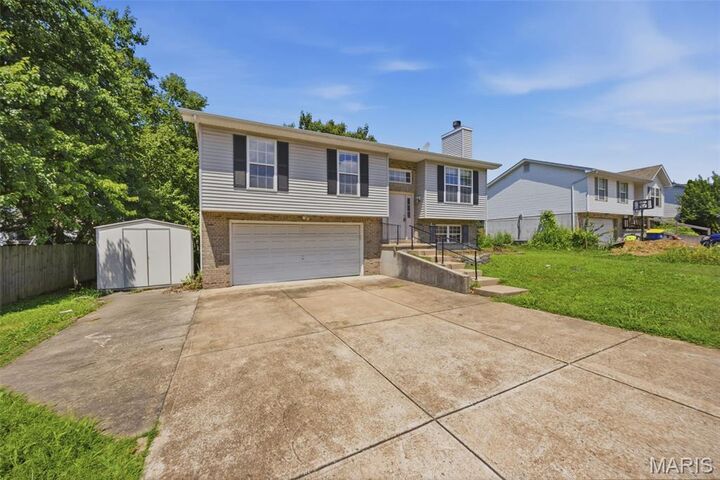 Property Photo:  1001 Parc Central Drive  MO 63028 