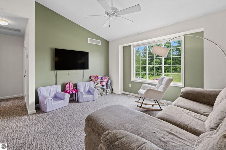 Property Photo:  4769 Sandtrap Drive  MI 49685 