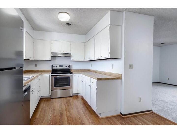 Property Photo:  1811 Greenfield Lane SW 12  MN 55902 
