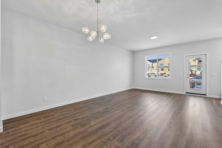 Property Photo: 40 Creekside Way SW 303 AB T2X 6E2