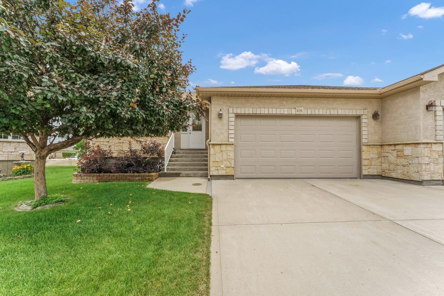 Property Photo: 108 Sandstone Place SE AB T1B 4R9