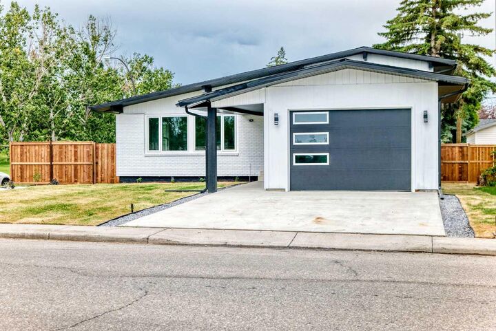 Property Photo: 1204 Lake Sylvan Drive SE AB T2J 3C8