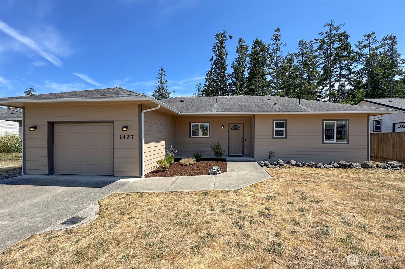 Property Photo: 1427 W Pendley Court WA 98363