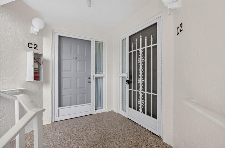 Property Photo:  104 Half Moon Circle D2  FL 33462 