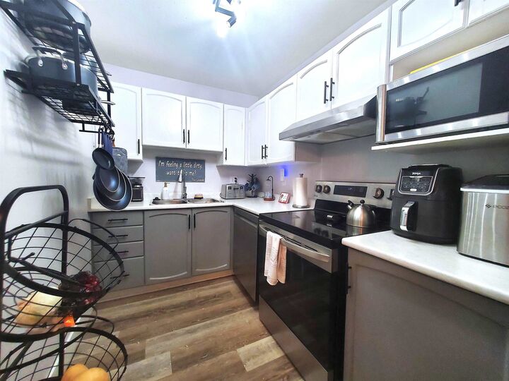 Property Photo: 2964 Trethewey Street 208 BC V2T 6P4