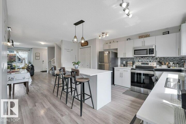 Property Photo: 19303 27 Avenue NW AB T6M 1K9