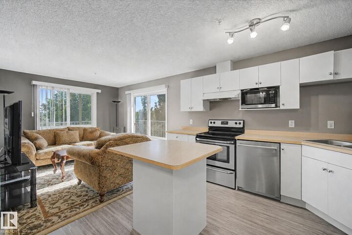 Property Photo: 7511 171 Street NW 311 AB T5T 6S7