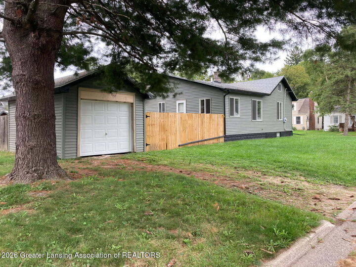 Property Photo:  2216 Sunnyside Avenue  MI 48910 