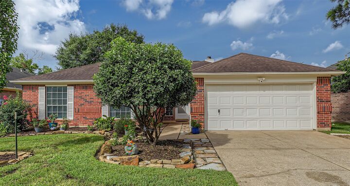 Property Photo: 1310 Hidden Canyon Road TX 77450