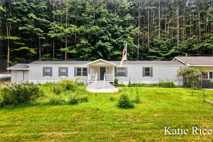 Property Photo:  6411 W Cleveland Road  MI 49437 